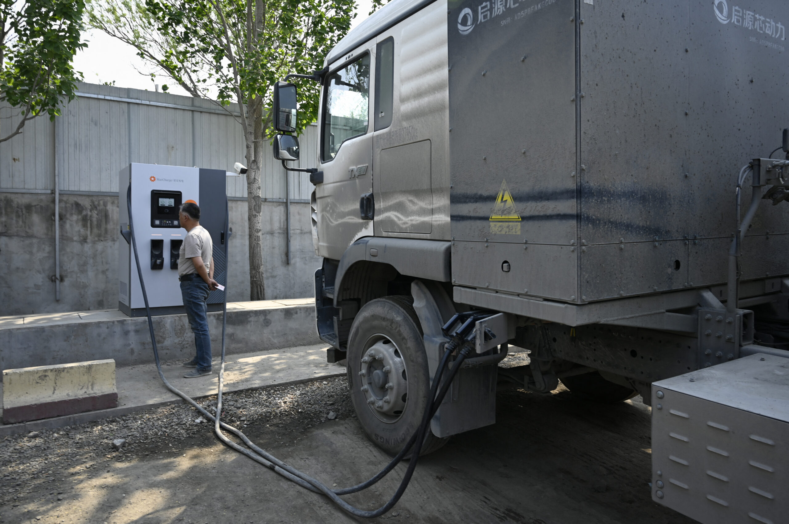 Chinese truck drivers are going electric as gas prices soar