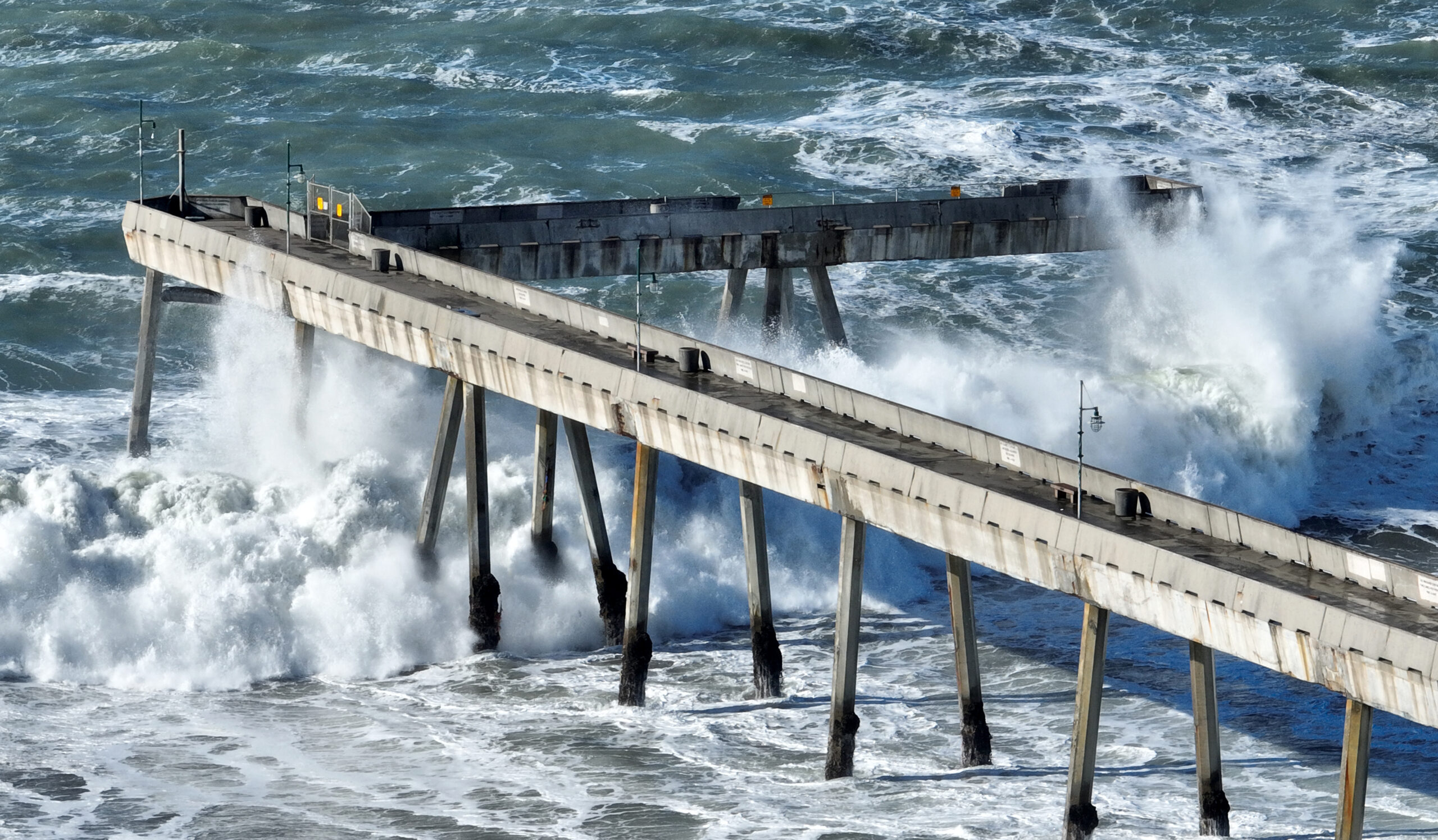 El Niño turns crumbling California pier into climate battleground over what to save — and who pays